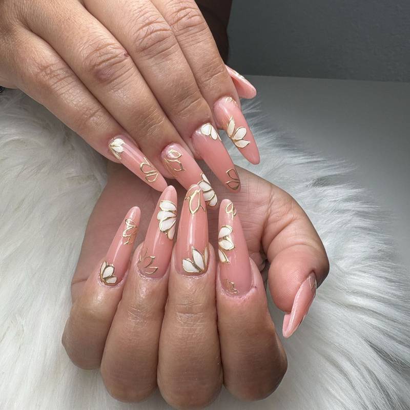 Long pink almond nails decorated with white and gold butterfly nail art — by Alice Garrido